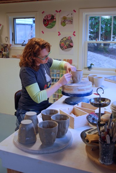Kristen Kieffer stamping in her Massachusetts studio