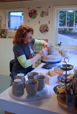 Kristen Kieffer stamping in her Massachusetts studio