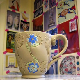 Kristen Kieffer stamped mug with blue flowers in progress